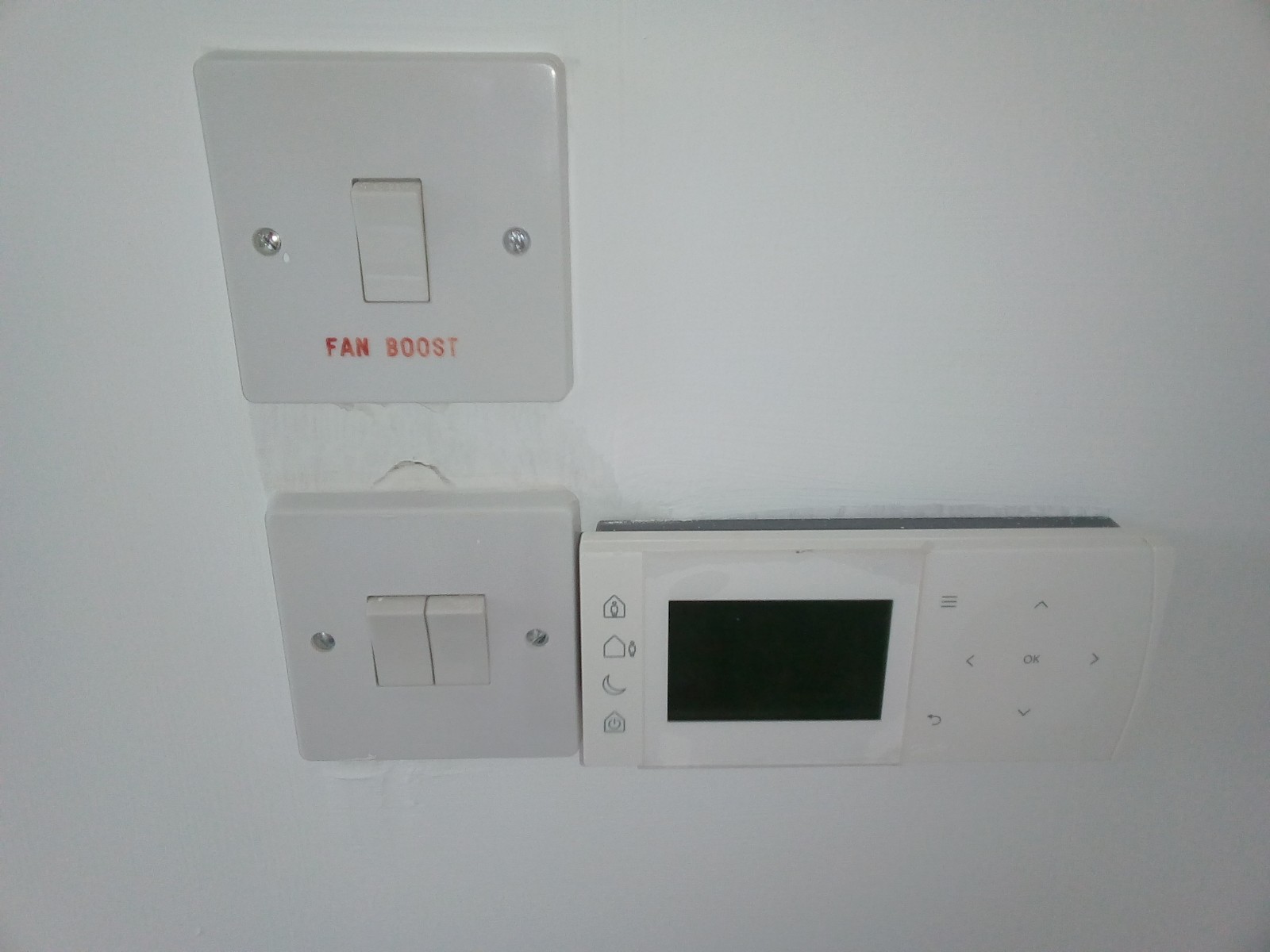 Poorly Installed Central Heating Controller and Light Switch Identified